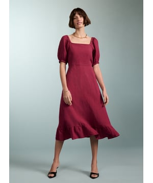 Description\nJuicy like a ripe raspberry and just the right side of crinkly, Nancy is the ultimate summer dress. This style in natural linen comes in a flattering, fit-and-flare silhouette, and a statement square neckline. Its sleeves are pretty and puffy, with elasticated details around the shoulder and cuffs. A style to breeze around in on a hot day, or on holiday, its criss-cross back makes it simply irresistible.\n\nMade in Europe\nCrafted in pure flax linen\nFastens with a concealed center back zip\nCan be worn with a strapless bra\nLong midi length\n\n\nSustainable Attributes:\n  Low Water Use   Natural fibres   Ethically made    Vegan \n\nDetails\n100% LinenDelicate Machine Wash - 30°Product code: DR40475-RASBack shoulder at neck to hem - 120cm (47 1/4)Sleeve length - 35cm (13 3/4)
