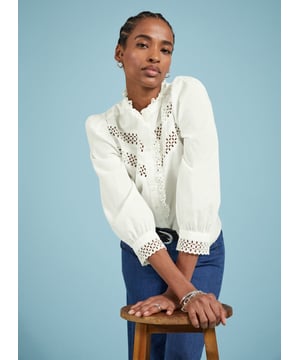 Description\nFits true to size, we suggest ordering your usual size.\nIf your weak spot is a romantic, white cotton blouse then prepare to be seduced by Isamaya! This style is loaded with panels of intricate broderie anglaise along the chest, and which also adorns the collar and front opening as a pretty ruffle. Even the cuffs are a moment, with more embroidery detail. Just add jeans for a feelgood, feminine outfit.\n\nMade in Europe\nCrafted in organic cotton voile\nButton cuffs\nGathering into sleeves and shoulders\n\n\nSustainable Attributes:\n  Natural fibres   Organic   Ethically made \nDetails\nModel is 5'10 (177cm) and is wearing a UK 10100% Organic Cotton Delicate Machine Wash - 30°Product code: SH40272-SFWBack shoulder at neck to hem - 61cm (24)Sleeve length - 56.5cm (22 1/4)