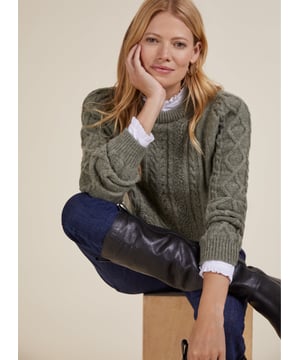 Description\nThis classic cable knit jumper is so desirable it’ll have you pining for a cold snap! And not just that: it’s proudly made using English wool from flock to factory in just 50 miles, supporting local farmers and UK manufacturers. We love the twisted yarns around the arms, and the neat(ish) fit which means you can style it with a denim skirt and ankle boots or over a white shirt with jeans.\n\nCrafted from pure British wool\nCable knit feature\nSemi-fitted\n\n\nSustainable Attributes:\n Made in Europe  Low Water Use   Mulesing free Natural fibres  Raw Material Traced \n\nDetails\n100% WoolHand Wash OnlyProduct Code: KW40238-PGRBack shoulder at neck to hem - 59cm (23 1/4)Sleeve length - 66.5cm (26¼)