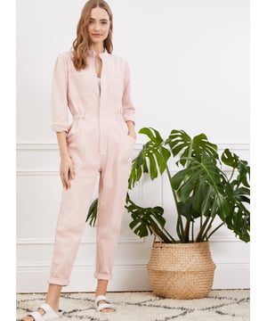 Description\nSally is quite literally a one-piece wonder! A feminine take on a boiler suit, we’ve added a ruffled stand collar and gathering into the shoulders, and for a flattering fit, a tapered leg shape and an elasticated waist. There are so many ways to style it: worn open with a tank and hi-tops, or fully fastened with big hoops and heels. Either way, expect to wear it on repeat.\nI love this. Easy one-piece style Baukjen\n\nCrafted in premium organic cotton\nZip fastening - simply pulls on\nPatch pockets on the chest and hips\nCan be styled with a belt\n\n\nSustainable Attributes:\n Made in Europe Ethically made  Vegan   Natural fibres   Organic \n\nDetails\n97% Organic Cotton, 3% ElastaneMachine Wash - 30°Product code: JS40045-PPKInside leg - 73cm (28 3/4)Sleeve length - 60.5cm (23 7/8)