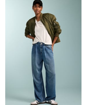 Description\nFits true to size, we suggest ordering your usual size.\n\nThese jeans are incredibly special. They look like classic indigo jeans with the wash and look of denim, but they are in fact made from soft and drapey TENCEL™. We’re quite proud to bring you this innovation because denim tends to have higher environmental impact. Using TENCEL™ instead means that this is significantly lower. And the real plus? It also makes for the most comfortable and soft style your legs will have experienced! Cut for a relaxed, wide-leg fit, you won’t want to take them off!\n\nCrafted in TENCEL™\nZip fly and button fastening\nClassic five-pocket jeans style\nWide leg shape\n\n\nSustainable Attributes:\n Made in Europe Low Water Use Ethically made  Vegan   Low Carbon  \n\nDetails\nModel is 5'10 (177cm) and is wearing a UK 10100% LENZING™ TENCEL™Delicate Machine Wash - 30°Product code: JN40008-MDWInside leg - 75cm (29 1/2)