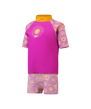 Radiate sunny positivity with our Water Explorers range. Featuring a collection of beaming sun characters this Short Sleeve Rash Top Set appeals to your little one’s sense of fun and includes a matching top andshorts. The pull-on rash top provides coverage for their shoulders  tummy and back and includes UVprotective fabric of UPF40+ for sun protection in and out of the water. Soft and stretchy  it’s made fromEndurance10 fabric  which contains CREORA® HighClo™ for a fit that stays like new for longerFeatures• Pull-on sun top - provides sun protection for the shoulders and tummy• Sold as a set with matching short• Higher chlorine resistance than standard swimwear fabrics - fits like new for longer with CREORA®HighClo™• Shape Retention - fabric stretches so you can enjoy your swim without feeling restricted