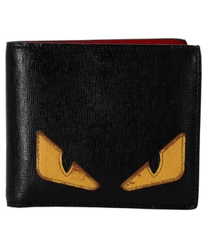 VINTAGE, RRP AS NEW
The Fendi Monster Bifold Wallet Compact in Black Leather combines high-end craftsmanship with a touch of playful personality. Made from grained calfskin leather, this wallet features the brand’s signature monster eyes on the facing flap, adding a whimsical and daring twist. Open the flap to reveal a striking red leather interior with card slots, patch pockets, and a bill compartment—offering both style and practicality. Perfect for the fashion-forward individual who loves to stand out, this compact wallet adds a fun yet luxurious element to your everyday essentials.


Fendi Monster Bifold Wallet Compact in Black Leather
Condition: good
Signs of wear: leather scuffs on the front
Packaging: None
Color: black
Material: Leather | sheep leather
Size: One Size | One Size
Measurements: Width: 20; Height: 100; Length: 110
SKU: NAPPUDESM461493W