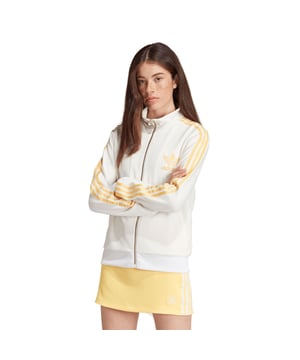 Womens adidas Originals Premium Originals Crepe Track Top in off white.Step into the '80s in this adidas track top  inspired by authentic style from decades past. With nostalgic colours and vintage vibes  it's made from a lightweight crepe material for extra texture and a breezy drape. The velvet Trefoil logo adds a soft touch  while the ribbed cuffs taper the fit. This product is made with at least 70% recycled materials. By reusing materials that have already been created  we help to reduce waste and our reliance on finite resources and reduce the footprint of the products we make.- This throwback track top is made in part with recycled materials.- Regular fit- Full zip with collar- 63% polyester (recycled)  33% viscose  4% elastane- Side pockets- Ribbed cuffs and hem- Hand wash cold- Ref: IT9875
