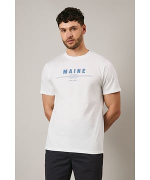 Soft jersey cotton t-shirt featuring the distinctive Maine rope graphic print
        Classic crew neckline with ribbed trim for a comfortable fit
        Short sleeves with clean-finished edges for everyday comfort
        Relaxed yet structured silhouette that maintains its shape throughout the day
        Versatile design that pairs effortlessly with both casual and smart-casual attire
    
    This Maine graphic t-shirt combines simplicity with subtle nautical flair, making it a wardrobe essential for the modern gent. The distinctive rope design adds character without overwhelming, perfect for those who appreciate understated style. Pair with dark chino shorts and trainers as shown for a refined summer look, or layer under an unstructured blazer with tailored trousers for smart-casual occasions. The breathable cotton fabric ensures all-day comfort whether you're meeting friends for a weekend brunch or enjoying a casual evening at the local pub. This t-shirt transitions seamlessly from daytime errands to relaxed evening gatherings, embodying that effortless British casual style that never feels overdone.