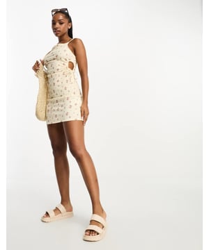 Dresses by Pieces Dress for the weather you want Floral design Square neck Fixed straps Cut-out sides Slim fitSold By: Asos