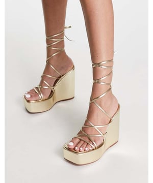 Shoes by ASOS DESIGN Dress from the feet up Tie-leg fastening Open toe Platform sole High wedge heelSold By: Asos