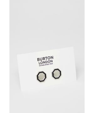 Distinctive hexagonal design for a contemporary twist on classic cufflinks
        Two-tone metal finish creates a sophisticated contrast
        Secure fastening mechanism ensures they stay in place throughout the day
        Polished metal surface reflects light for subtle sophistication
        Versatile size suitable for both standard and French cuff shirts
    
    These striking hexagon cufflinks from Burton offer the perfect finishing touch to your formal attire. The bold geometric design presents a modern interpretation of traditional cufflinks whilst maintaining a timeless appeal. Pair with a crisp white shirt for important meetings or job interviews to convey attention to detail. For evening events, these cufflinks complement a classic dinner suit brilliantly, adding just the right amount of personality without overwhelming your ensemble. The contrasting silver and black elements make them remarkably versatile, working seamlessly with various shirt colours and suit styles. Whether you're attending a wedding, important business meeting or simply want to sharpen up your office attire, these cufflinks provide that refined touch that demonstrates sartorial confidence. A subtle yet impactful way to express your style whilst maintaining professional decorum.