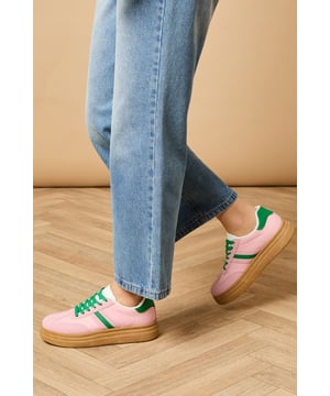 Faux leather platform trainers with eye-catching two-tone design
        Chunky gum sole adds height and distinctive retro appeal
        Contrasting heel tab detail for added visual interest
        Lace-up fastening ensures secure and adjustable fit
        Rounded toe shape offers comfortable everyday wear
    
    The Eudora platform trainers bring playful charm to your casual wardrobe with their distinctive two-tone design. These statement shoes feature a chunky platform sole that adds a subtle lift while maintaining all-day comfort. Style them as shown with relaxed denim jeans and a simple tee for an effortlessly cool weekend look, or pair with a floaty midi dress to create a stylish contrast. The retro-inspired silhouette works brilliantly with wide-leg trousers or cropped styles that showcase the unique design details. Perfect for city exploring, coffee dates or casual shopping trips, these versatile trainers will quickly become your go-to footwear for adding a touch of personality to your everyday ensembles. The lace-up design allows for a customised fit whilst the durable outsole provides reliable traction for your daily adventures.