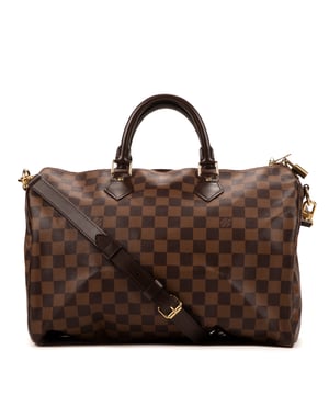 Louis Vuitton Tassen Speedy Bandouliere 35 Handtas in de Bruin Gecoat canvas in de Gouden Messing  hardware. Het product is in In Perfecte Staat (AA).
  Afmetingen: 35x22x18 cm 
  Inclusief accessoires: Strap; Cadenas; Keys
      
  BrandCo Paris vindt zeldzame artikelen in de beste staat voor ongelooflijke prijzen. Het is de moeite waard om geduldig te zijn! Koop met vertrouwen: alle artikelen van BrandCo Paris worden zorgvuldig geselecteerd en geverifieerd door ons team van experts.

  Alle artikelen worden geleverd met een certificaat van echtheid en verpakt door BrandCo Paris.

  Classificatietabel voor de conditie van het artikel:

  N (als nieuw)
  AA (perfecte staat)
  A (uitstekende staat)
  AB (zeer goede staat)
  B (goede/redelijke staat)