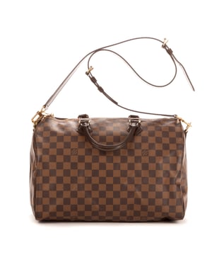 Louis Vuitton Tassen Speedy Bandouliere 35 Handtas in de Bruin Kalfsleer in de Gouden Messing  hardware. Het product is in In Perfecte Staat (AA).
  Afmetingen: 35x23x18 cm 
  Inclusief accessoires: Strap; Cadenas; Keys; Dustbag
      
  BrandCo Paris vindt zeldzame artikelen in de beste staat voor ongelooflijke prijzen. Het is de moeite waard om geduldig te zijn! Koop met vertrouwen: alle artikelen van BrandCo Paris worden zorgvuldig geselecteerd en geverifieerd door ons team van experts.

  Alle artikelen worden geleverd met een certificaat van echtheid en verpakt door BrandCo Paris.

  Classificatietabel voor de conditie van het artikel:

  N (als nieuw)
  AA (perfecte staat)
  A (uitstekende staat)
  AB (zeer goede staat)
  B (goede/redelijke staat)