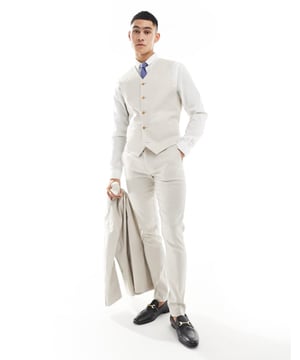 Suits by ASOS DESIGN Do the smart thing V-neck Button placket Pocket details Contrast back with an adjustable cinch Skinny fitSold By: Asos