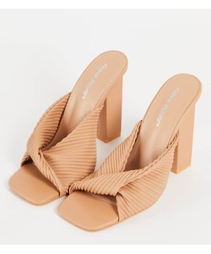 Heels by Public Desire Level up Slip-on style Twist strap Open toe High block heel Wide fitSold By: Asos