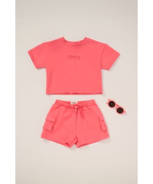 Keep your little one on trend this season with this 3-piece outfit set from Fudo. The set includes a heavyweight oversized T-shirt with a tonal chest logo, matching shorts with two large side pockets and a drawstring waist, plus stylish sunglasses. A comfy, trendy set that blends fashion and function for your little one’s wardrobe.