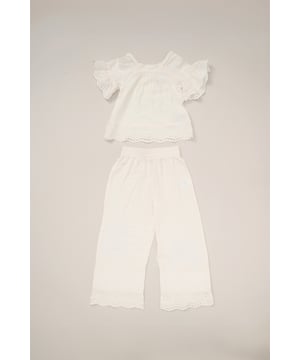 This co-ord set by Miss is a stylish blend of comfort and style. The top features floaty sleeves, while the wide-leg trousers bring effortless elegance. Both pieces are adorned with broderie and crochet panel detailing, making it a perfect choice for sunny days and special outings.