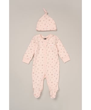 This adorable 2-piece set from DKNY includes a soft cotton all-in-one and a matching hat to keep little ones comfy and covered. Lightweight and breathable, it's perfect for warm spring days or summer naps. An easy all-day outfit for play, cuddles, and everything in between.