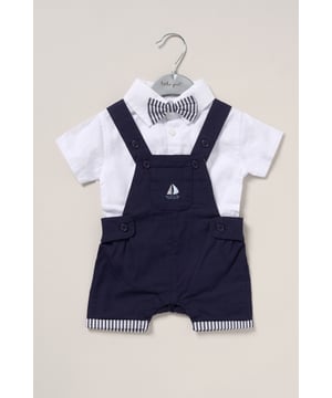 Dress your little one in style with this adorable bodysuit shirt and dungarees set by Little Gent. Complete with a charming bowtie, this outfit is perfect for any occasion. Designed with playful charm and practicality in mind, it’s an ideal choice to keep your little one looking dapper all day long.