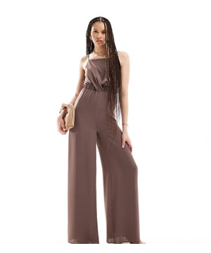 Jumpsuits & Playsuits by ASOS Tall Your no effort, effort-maker Square neck Adjustable straps Twist detail Elasticated waist and back panel Wide leg Regular fitSold By: Asos