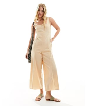 Jumpsuits & Playsuits by ASOS DESIGN No need for a dress to impress Plain design Square neck Fixed straps Tie-back fastening Stretch back panel Regular fitSold By: Asos