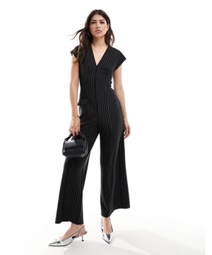 Jumpsuits & Playsuits by ASOS DESIGN Low effort, high reward Plain design V-neck Cut-out back Tie-keyhole back Regular fitSold By: Asos