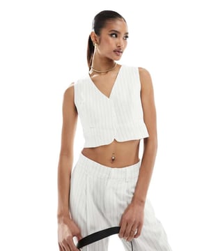 Suits & Separates by In The Style Part of a co-ord set Trousers sold separately Stripe design V-neck Button placket Concealed buttons Regular fitSold By: Asos