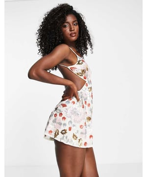 Playsuit by Miss Selfridge No need for a dress to impress Floral embellishment Plunge neck Cami straps Open back Regular fitSold By: Asos