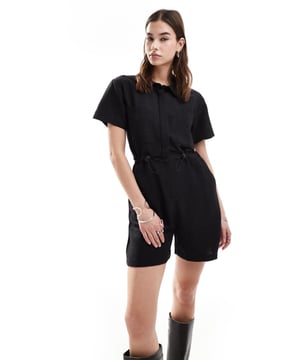 Jumpsuits & Playsuits by Reclaimed Vintage Co-ordinating made easy Spread collar Adjustable waist Short sleeves Chest pockets Regular fitSold By: Asos