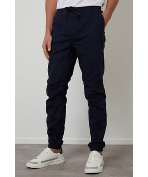 Upgrade your casual wardrobe with these jogger-style cuffed trousers from Threadbare. With two side pockets and two back flap pockets, this style has an elasticated waistband with drawcords, cuffed hem and are made in an easy to wear stretch cotton fabric. Throw on a casual hoodie and a padded gilet for an off-duty look.