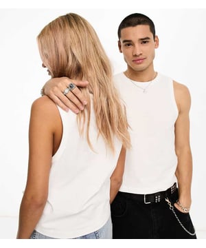 Tops by Calvin Klein Jeans  Round neck Sleeveless style Logo tab to side Regular fit Unisex styleSold By: Asos