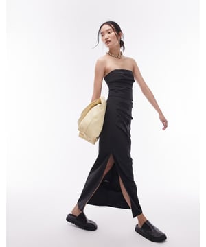 Skirts by Topshop Welcome to the next phase of Topshop High rise Stretch-back waistband Side split Regular fitSold By: Asos