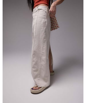 Skirts by Topshop Welcome to the next phase of Topshop Low rise Raw-cut waist Functional pockets Kick split Regular fitSold By: Asos