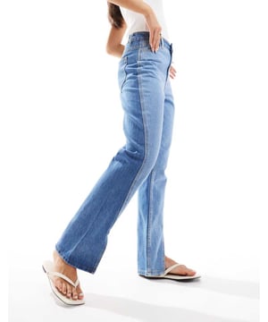 Jeans by Y.A.S Join the jean scene Straight fit High rise Belt loops Five pockets Branded patch to reverse Split hemSold By: Asos