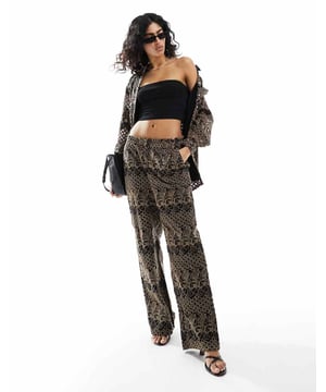 Trousers & Leggings by Y.A.S Part of a co-ord set Shirt sold separately Low rise Elasticated waistband Side pockets Wide legSold By: Asos
