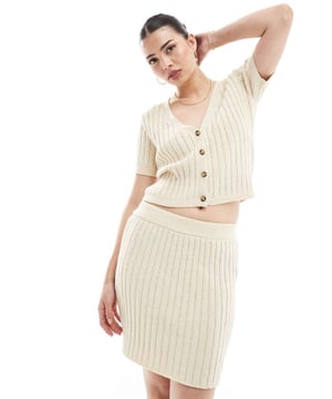Skirts by Vero Moda Part of a co-ord set Cardigan sold separately High rise Elasticated waistband Regular fitSold By: Asos