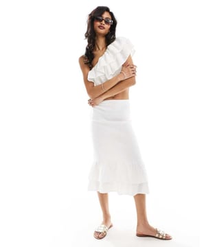 Skirts by Abercrombie & Fitch Part of a co-ord set Top sold separately High rise Elasticated waist Ruffle detail Slim fitSold By: Asos