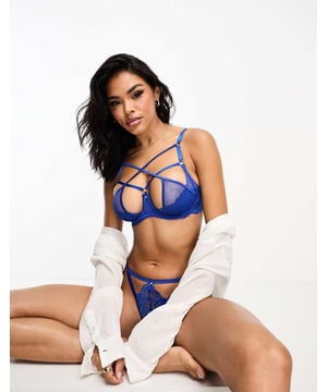 Lingerie & Nightwear by Hunkemoller Non-padded cups Strapping detail Underwire support Adjustable straps Hook-and-eye fastening Nipple covers not includedSold By: Asos
