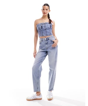 Jeans by Miss Selfridge The denim of your dreams Regular mom fit High rise Belt loops Five pocketsSold By: Asos