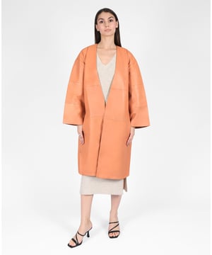 Mid length leather duster deep v-neck coat with side pockets.
- Collarless design
- Open front
- Side pockets
- Longline cut
- Regular fit
- 100% leather
- Dry clean only
- Made in India