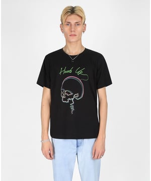 Revamp your casual style with the  Heads Up T-Shirt from Bolongaro Trevor. This classic crew neck tee features a striking skull print, perfect for adding a touch of edge to your everyday wardrobe. Bold skull graphic on the front makes a daring statement and adds an edge to any look. Timeless crew neck design offers a versatile, easy-to-wear fit. Crafted from 100% cotton for comfort and durability, keeping you at ease throughout the day.