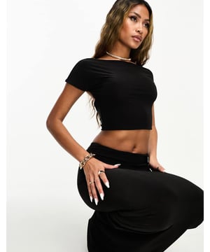 Tops by Kaiia Part of a co-ord set Skirt sold separately High neck Cap sleeves Open back Cropped length Slim fitSold By: Asos