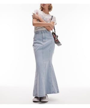 Skirts by Topshop Petite Welcome to the next phase of Topshop High rise Belt loops Functional pockets Fishtail hem Regular fitSold By: Asos
