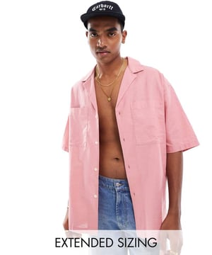 Shirts by ASOS DESIGN Summer, styled Revere collar Button placket Chest pockets Drop shoulders Oversized fitSold By: Asos