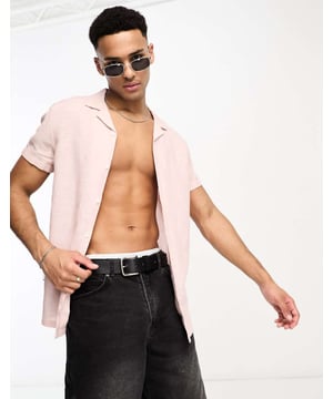 Shirts by ASOS DESIGN Add-to-bag material Revere collar Button placket Roll sleeves Regular fitSold By: Asos