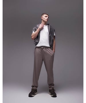 Trousers & Chinos by Topman This is Topman Plain design Regular rise Elasticated waistband Tie waist Pockets to side and back Regular, tapered fitSold By: Asos