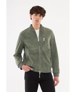 Bomber jacket from Bolongaro Trevor in soft real suede. This classic bomber features a bomber rib neck, two way zip front, zip pockets, rib cuffs and hem. This jacket has all the quintessential markers of a great leather jacket. Our model is 189 cm tall and is wearing size M.