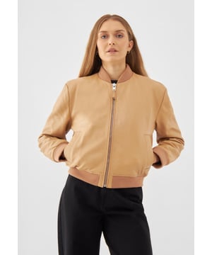 Bomber jacket from Bolongaro Trevor in soft real leather. This classic bomber features a bomber rib neck, welt pockets, rib cuffs and hem. This jacket has all the quintessential markers of a great leather jacket.
Our model is 170 cm tall and is wearing size S.