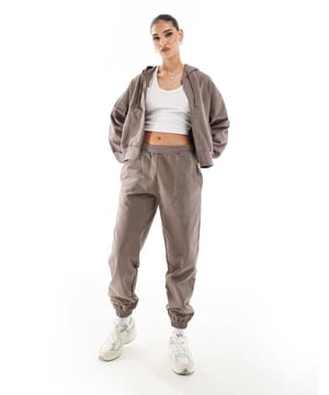Joggers by The Couture Club Part of a co-ord set Hoodies sold separately Elasticated waistband Side pockets Elasticated cuffs Relaxed fitSold By: Asos
