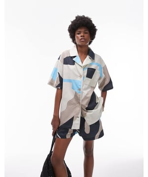 Trousers & Leggings by Topshop This is Topshop Notch collar Button placket Chest pocket Abstract print Regular fitSold By: Asos