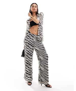 Trousers & Leggings by SNDYS Part of a co-ord set Shirt sold separately High rise Elasticated waistband Wide legSold By: Asos