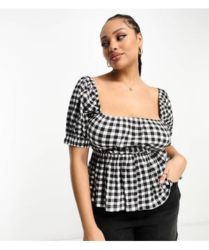Tops by ASOS Curve Introduce it to your other nice tops Gingham design Puff sleeves Shirred, stretch panels Regular fitSold By: Asos